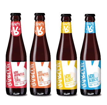 Four craft beer bottles with colorful labels featuring a 'KB' logo and 'LEVBELTE' branding.