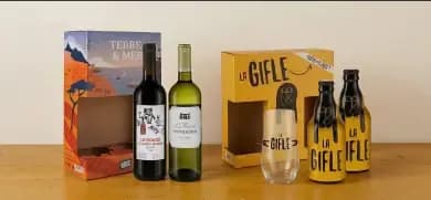 Assortment of wine bottles and "LA GIFLE" branded alcoholic beverages with their packaging.