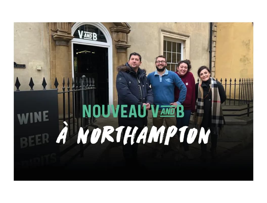Five people smiling outside a 'V&B' store with 'Nouveau V&B à Northampton' overlay.